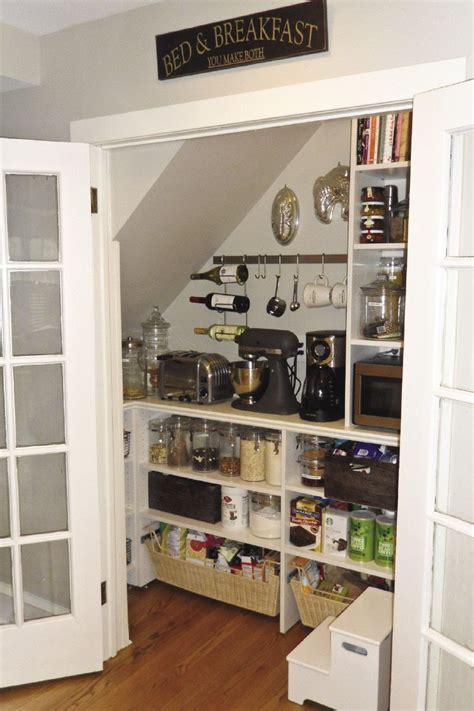 We also decided that at the same time we would also organize the small pantry in we installed the shelves on the back of the closet under the stairs first, and then we worked our way forward. Under Stairs Pantry Ideas - layjao