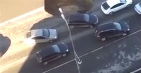 Video Close Call For Driver As Sinkhole Nearly Swallows Car Newstalk