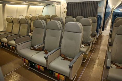 The Economy Class Cabin Of A Philippine Airlines Boei Vrogue Co