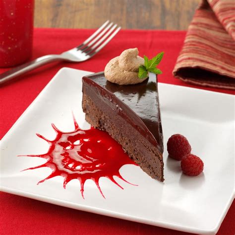 Chocolate Ganache Cake With Raspberry Sauce Recipe Taste Of Home