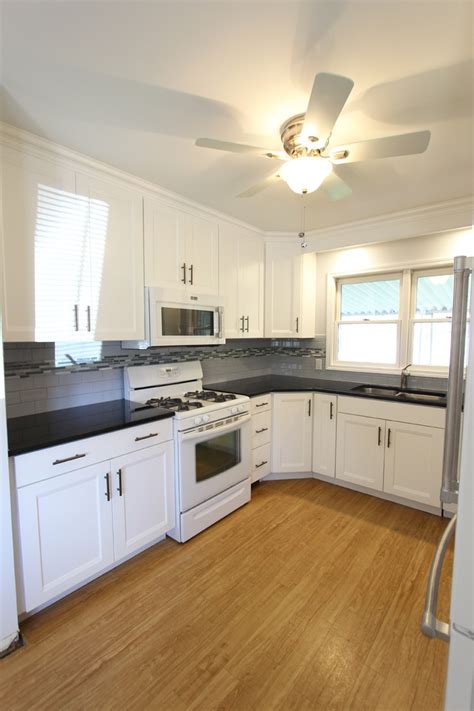 Check spelling or type a new query. White Thermofoil Cabinets with Black Pearl Granite ...