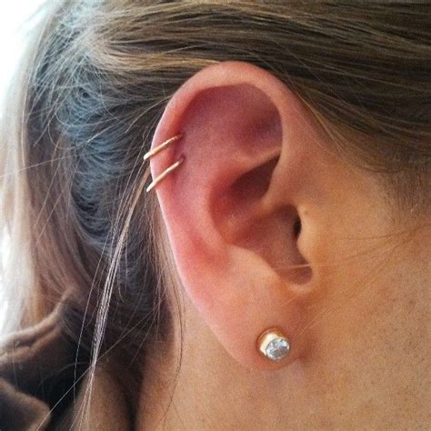 Button earrings, dangle earrings, drop earrings, hoop earrings Double cartilage piercings with 14k yellow gold clickers ...