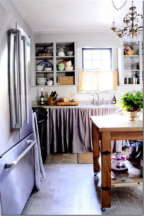 The bright orange kitchen cabinets look perfect with the transparent, same shade curtain. Enjoyable Curtains For Open Kitchen Cabinets Ideas ...