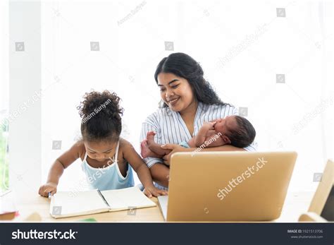 African American Mother Holding Newborn Baby Stock Photo 1921513706