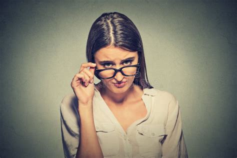 Angry Woman With Glasses Skeptically Looking At You Stock Photo Image