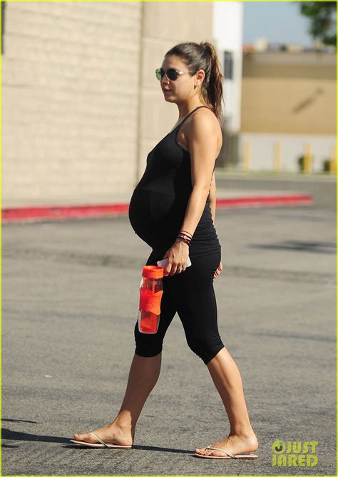 Mila Kunis Flaunts Large Baby Bump In Her Yoga Outfit Photo