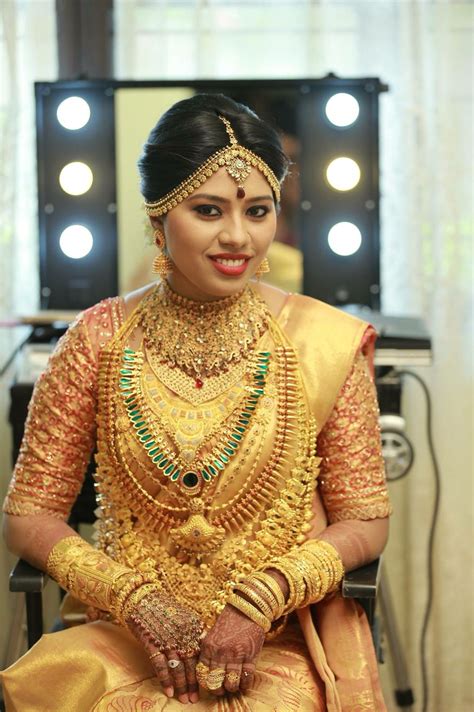 South Indian Bride Golden Saree Kerala Indian Bridal Wear Indian Wedding Jewelry Wedding