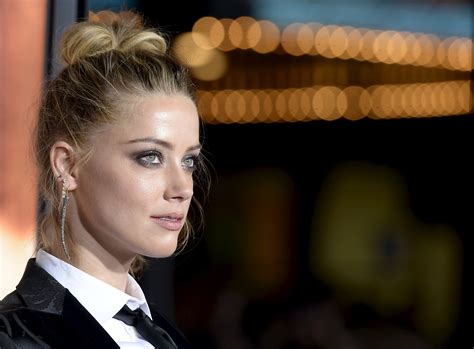 Amber Heard Will Face Trial In Australian Dog Smuggling Case Time