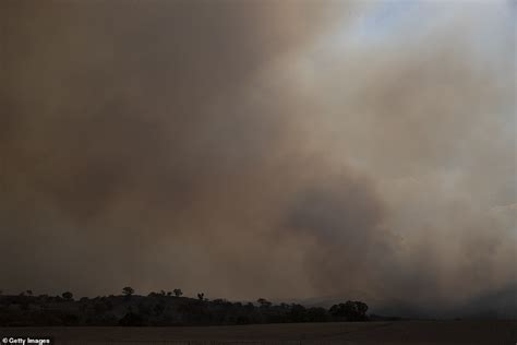 Residents Flee Their Homes As A State Of Emergency Is Declared In Canberra Due To Bushfires