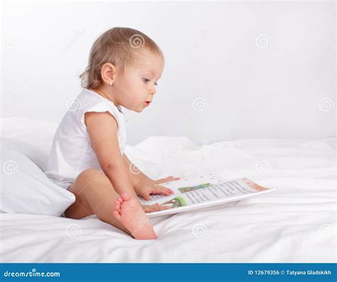 Baby Reading Book Stock Photo Image Of Human Blond 12679356