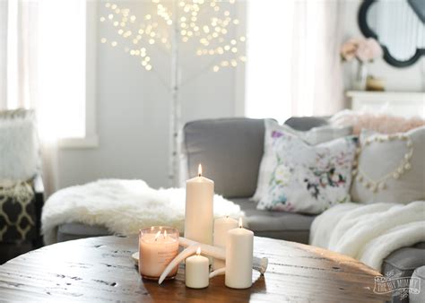 Silver tree ornaments for winter living room decoration can be used to beautify your living room. How to Create a Cozy, Hygge Living Room this Winter