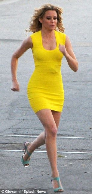 Elizabeth Banks Parades Her Trim Figure In A Yellow Bodycon Dress As