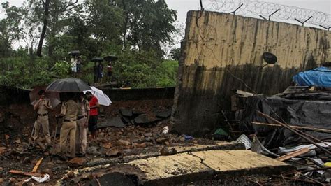 Heavy Rains Pound Indias Mumbai Disrupting Rail Air Traffic India