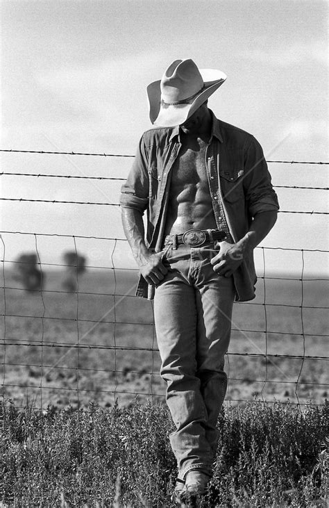 Very Sexy Cowboy With An Open Shirt Leaning On A Fence In New Mexico Rob Lang Images