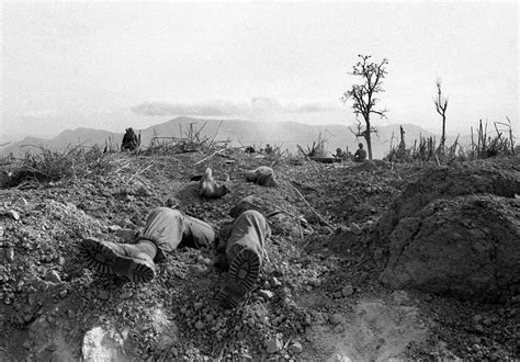 The Bodies Of Us Marines Lie Half Buried On Hill 689 About Two And A