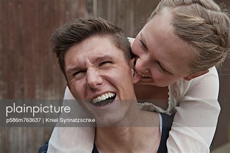 Woman Biting Mans Ear Stock Image Everypixel
