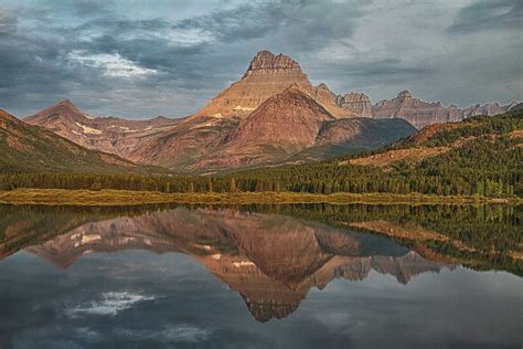 Mountain Reflection Over Swiftcurrent Lake In Glacier National Park