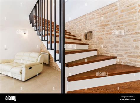 Living Room Interior With Wooden Stairway Stock Photo Alamy