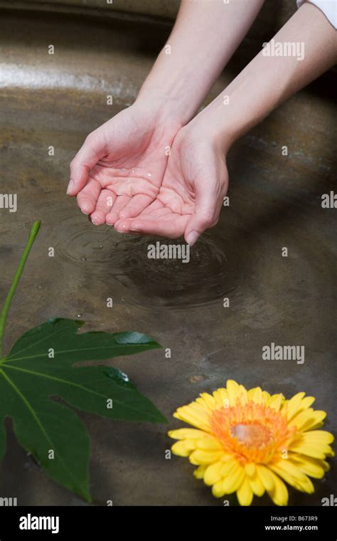 A Woman With Cupped Hands Stock Photo Alamy