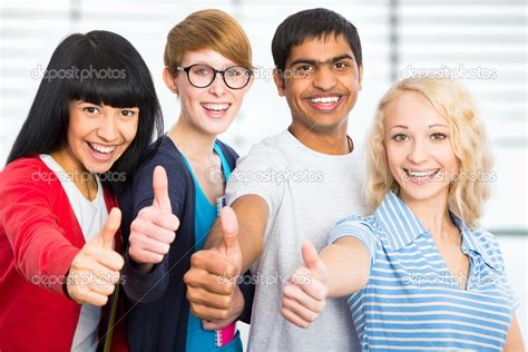 Students Giving The Thumbs Up Sign Stock Photo By ©chagin 44740735