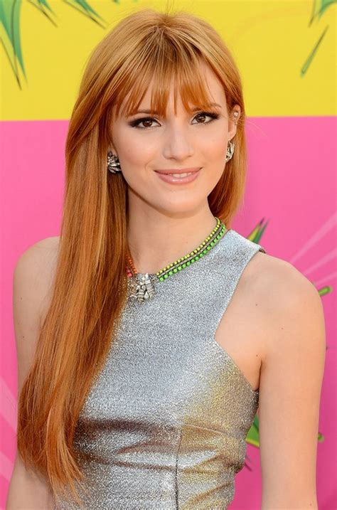 Bella Thorne Long Copper Straight Hairstyle With Wispy Bangs For Fall