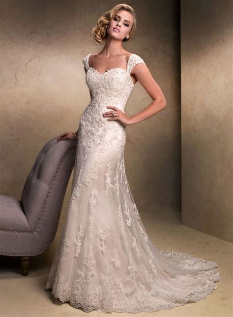 This site covers everything you need to know to plan your wedding. 18 Most Beautiful Wedding Dresses of the Week - MODwedding