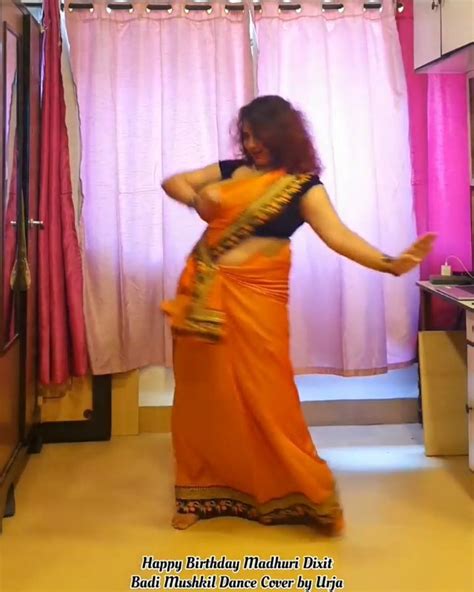 Busty Aunty Dancing In Orange Saree