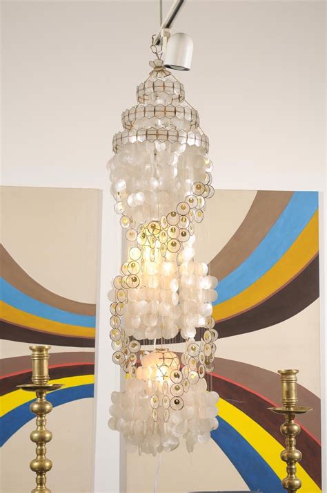 This discovery brought me to today's project: Vintage Capiz Shell Chandelier with Gold Accents at 1stdibs