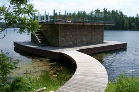 Le Blancq Designed Floating Stone And Steel Boathouse With 28 X 32 Roof