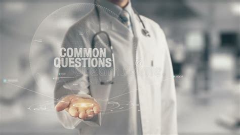 Doctor Holding In Hand Common Questions Stock Image Image Of Biotech