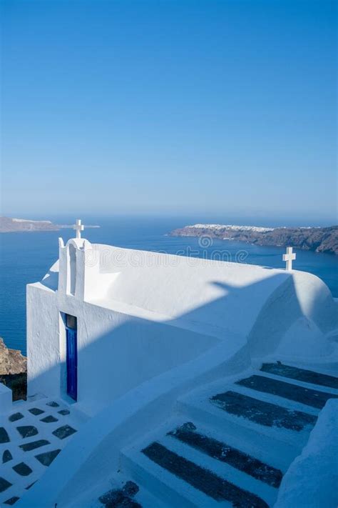 White Church At Fira Santorini Panoramic View Of Mountains Sea And