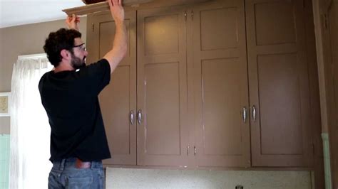 Crown molding helps to dress up cabinets and hide dusty soffit spaces. Removing Upper Cabinet Crown Molding - YouTube