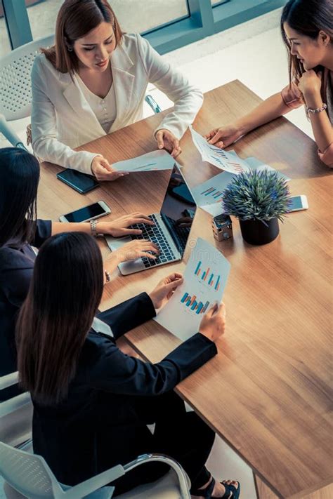 Businesswomen In Meeting Laptop Computer On Table Stock Photo Image