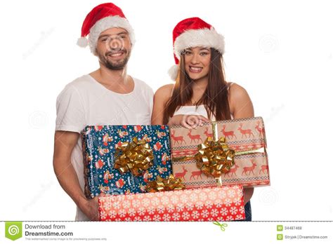 Channel for the original series young couple shot in chicago, il. Happy Couple Carrying Christmas Gifts Stock Photo - Image ...