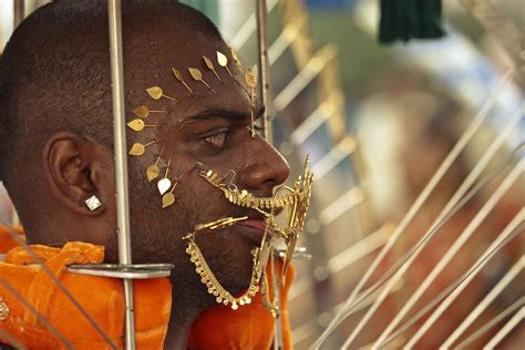 When it's celebrated in malaysia it's a dynamic, colourful, happy yet devotional the festival of thaipusam was brought to malaysia in the 1800s, when indian immigrants started to work on the malaysian rubber estates and. Thaipusam Festival: Piercings and Other Rituals