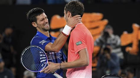 Defending champion djokovic ended qualifier karatsev's dream run to secure a berth in his ninth australian open final. Novak Djokovic Reveals What Medvedev Said to him at the Net - EssentiallySports