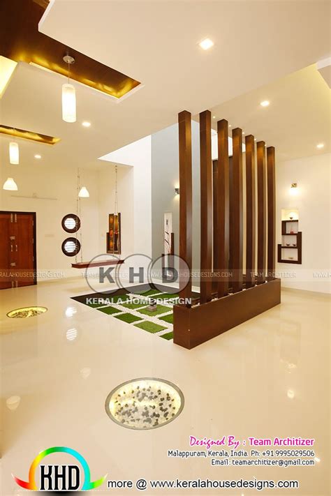 The Interior Of A Modern House With White Floors And Wood Columns On