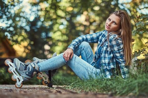 Premium Photo A Beautiful Woman In A Fleece Shirt And Jeans Resting