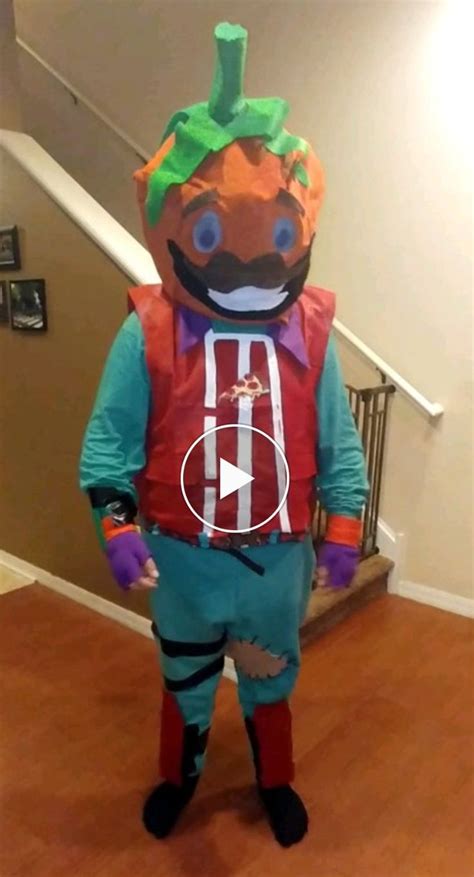 A Person In A Costume Standing On A Wooden Floor With A Stair Case