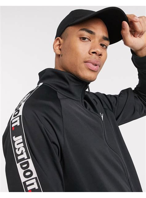 Nike Just Do It Zip Through Polyknit Taping Track Jacket In Black For