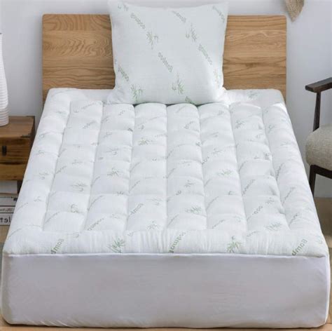 The designer uses bamboo rayon blend that is a silky fabric to be the cover of the mattress. Bamboo Mattress Topper Cooling Pillow Top Mattress Pad