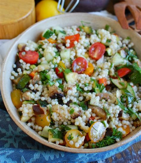 Warm couscous and chickpeas tossed in vinaigrette topped with tomatoes. Mediterranean Grilled Vegetable Couscous Salad - A Cedar Spoon