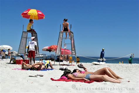 Cape Town Daily Photo Girls Lifeguards And Blue Flags