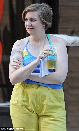 Lena Dunham Wears Ill Fitting Yellow Trousers And Unflattering Blue