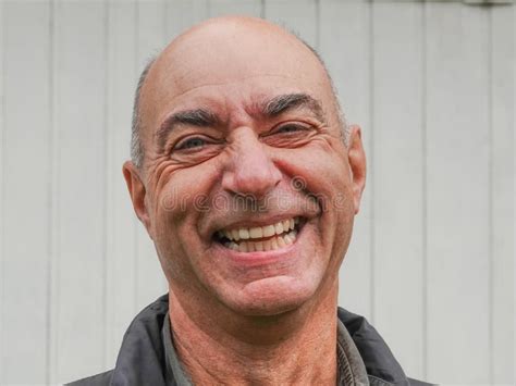 Handsome Mature Happy Bald Man Smiling At The Camera Stock Image