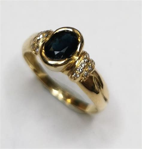 18 Karat Gull Ring 106 Ct Safir Diamanter Catawiki