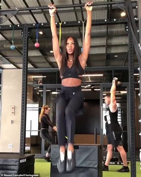 Naomi Campbell Exhibits Her Incredibly Toned Abs In Sports Bra During