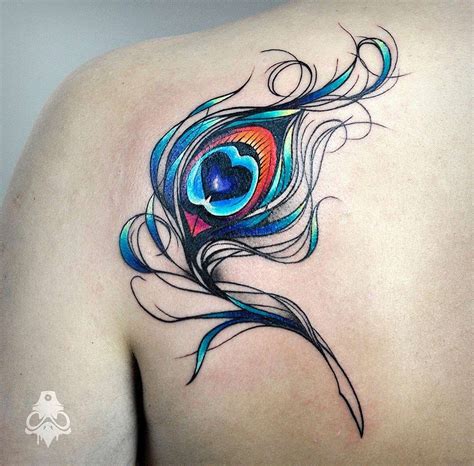 Vibrant Peacock Feather On Girls Shoulder Blade Best Tattoo Design Ideas