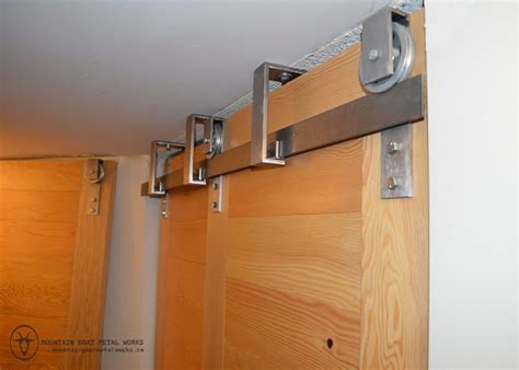 Here's the 3 bypass (i'd get doors to match the house, probably single panel). This floor to ceiling door hardware system can enable 2 ...