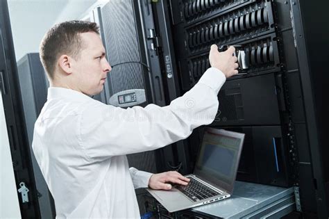 Storage Maintenance Service Engineer In Server Room Stock Photo